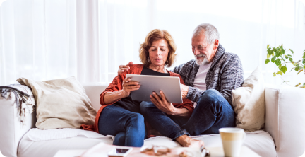 Senior couple relaxing in their home